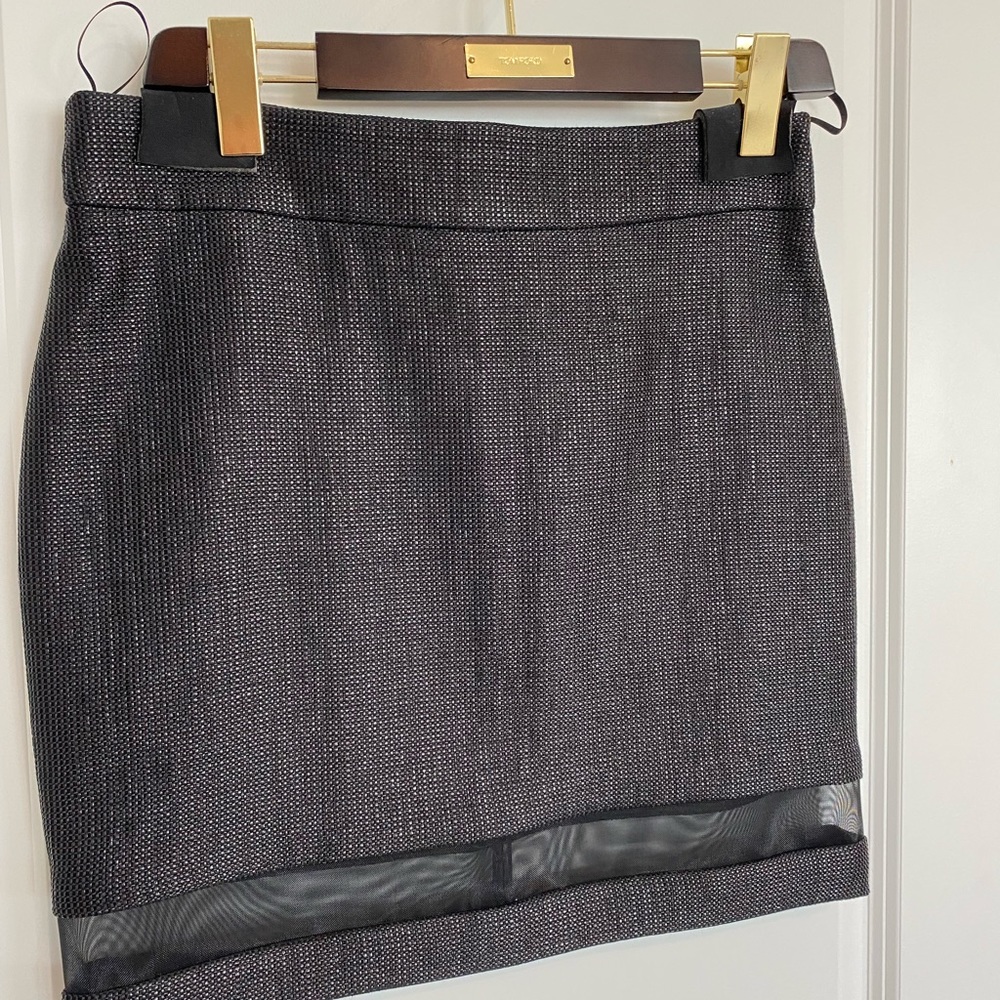 Tom Ford black nylon Euro size 42 (US 8) miniskirt with mesh hem. Worn once!